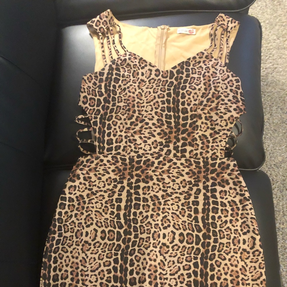 Leopard print dress with openings on side